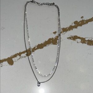 Elegant Silver Necklace with Teardrop Pendant